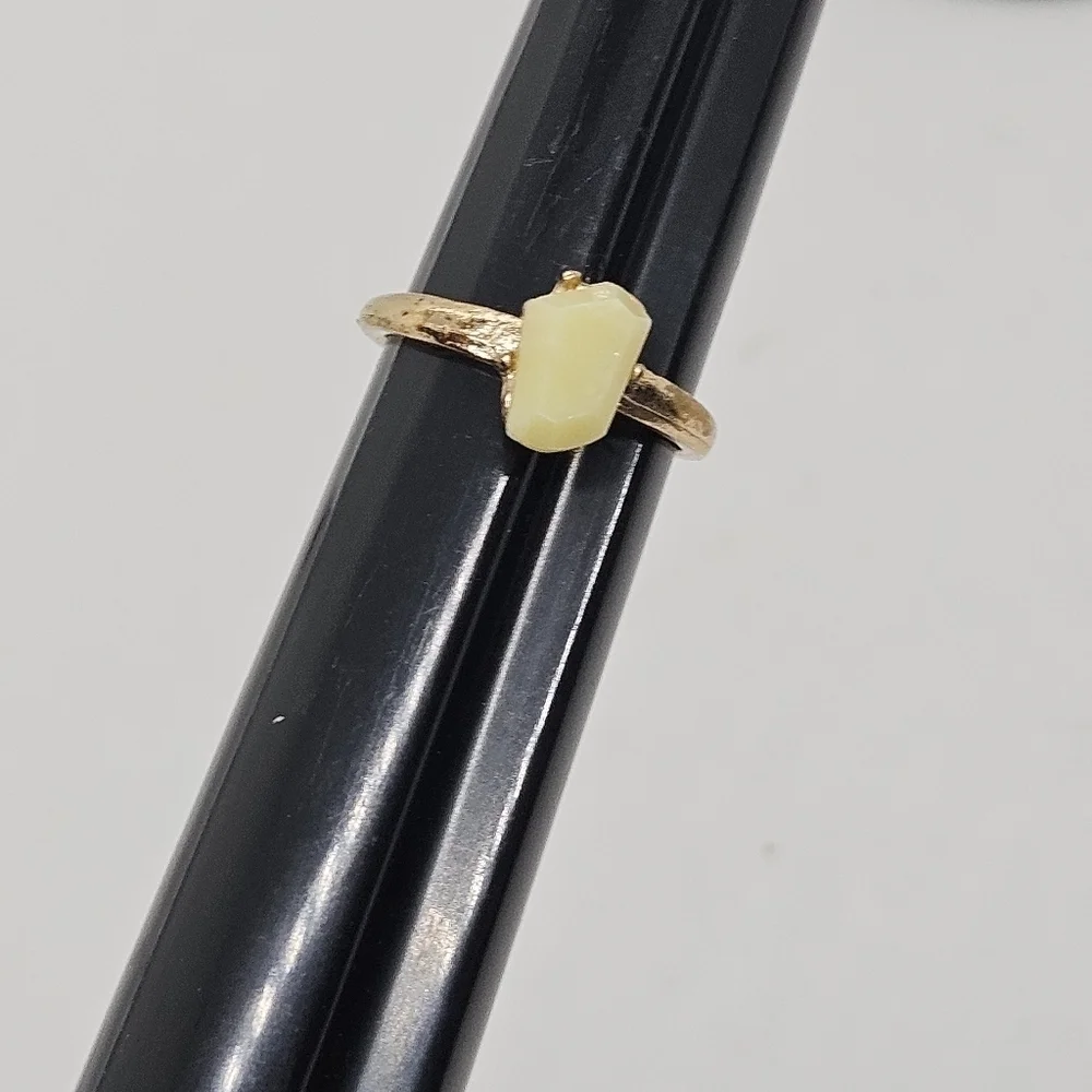 gold tone ring with light yellow faux stone size 6.5